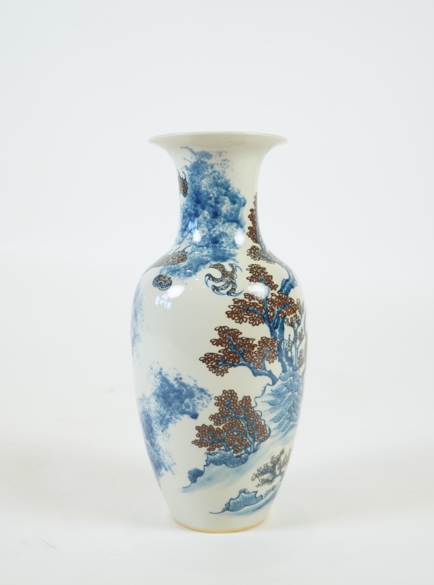 A Chinese underglaze blue and copper red ’dragon and tiger’ baluster vase, possibly 19th century